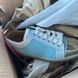 Lou Boutin  Blue and Silver sneakers never worn new new